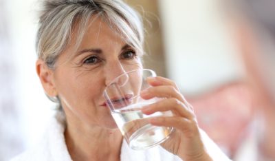 Woman drinking a glass of water